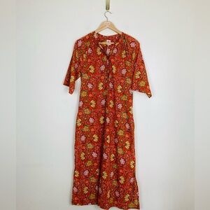 dRA Anthropologie orange and floral block print caftan midi dress. Size Small